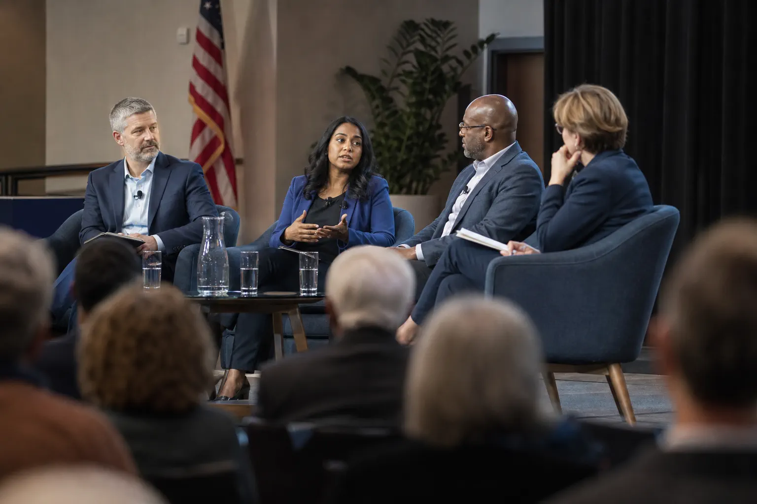 A civic panel discussing transparency, privacy, and responsible AI policy