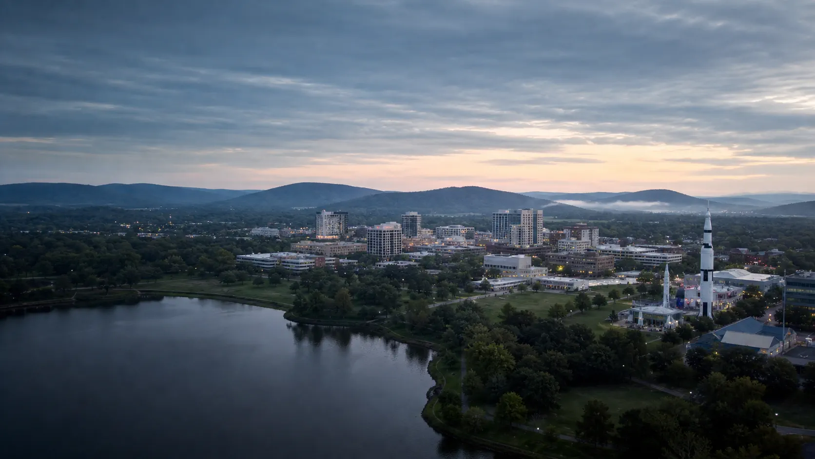 Aerial view of Huntsville at dawn with the U.S. Space and Rocket Center on the skyline